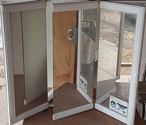 Three Door Mirror Vanity With Shelves 