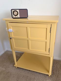 Yellow Painted Wood Cabinet with Bottom Shelf