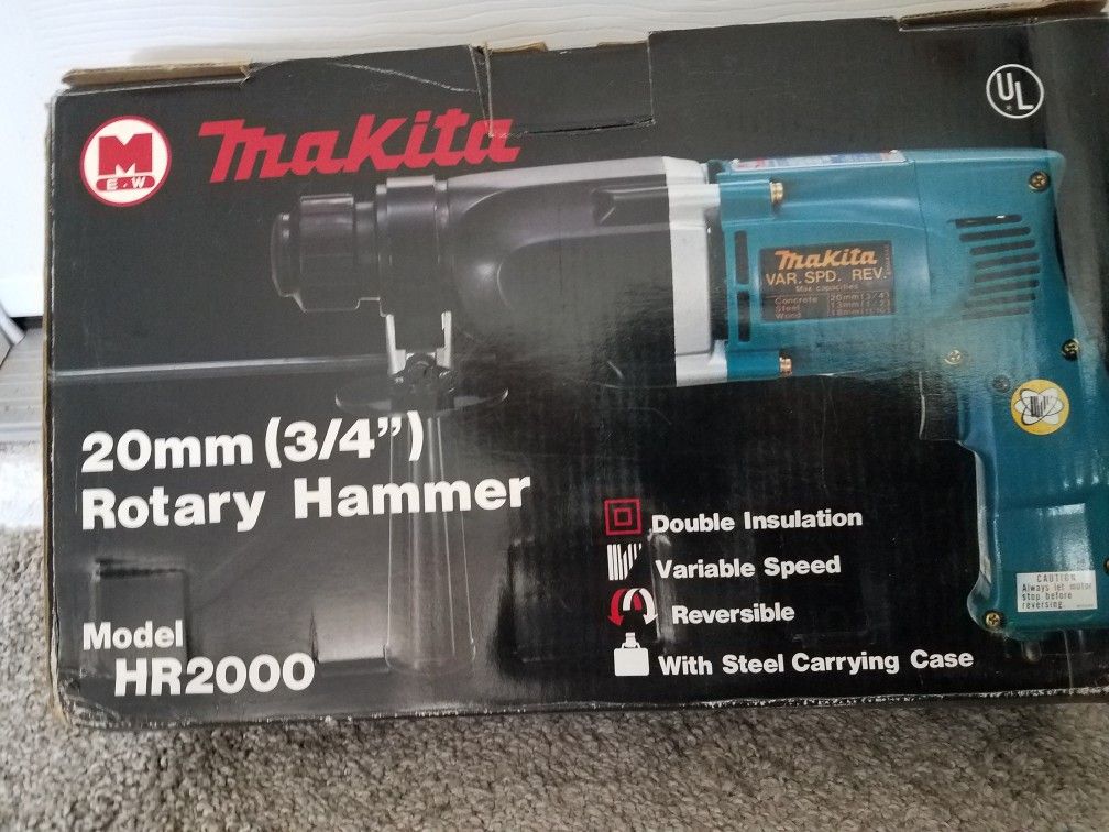 Makita 3/4 inch rotary hammer drill model HR 2000 brand new never used