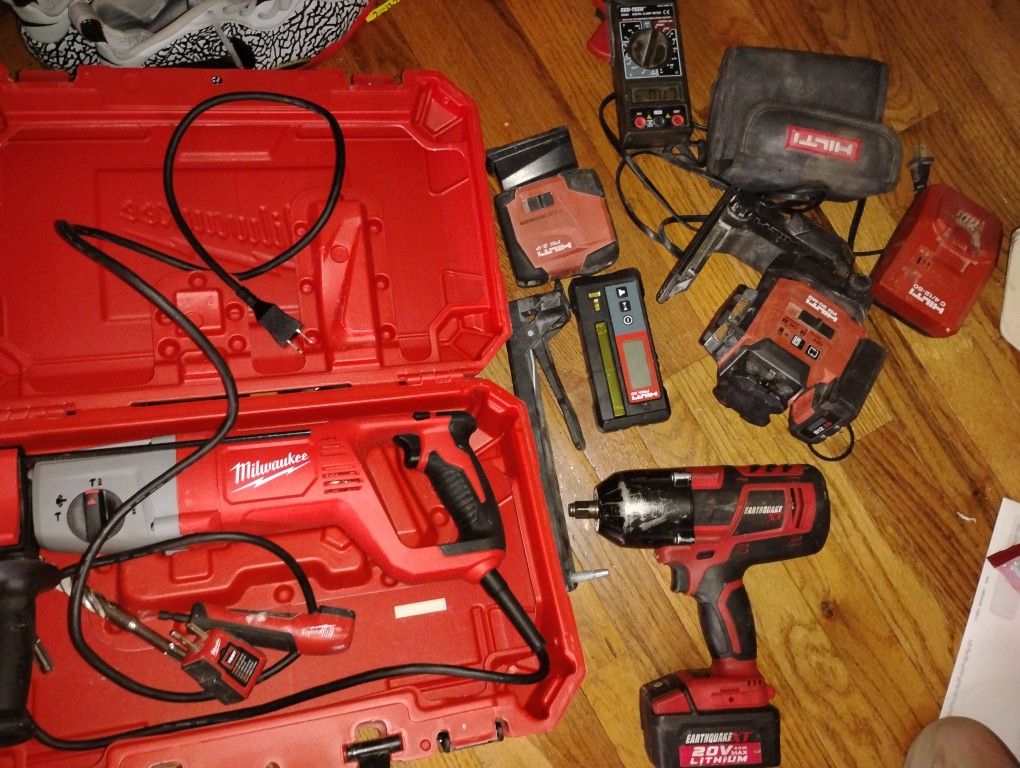 Great Set Milwaukee Brand New Rotary Hammer In Box With Hilti Multi Angle Laser Set Very Expensive With Earthquake Impact Wrench 20 V With Battery