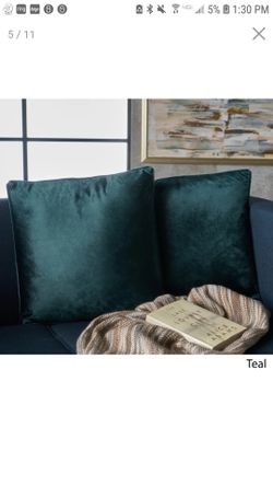 Four teal pillows