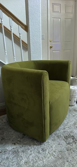 2 Green - World Market swivel chairs