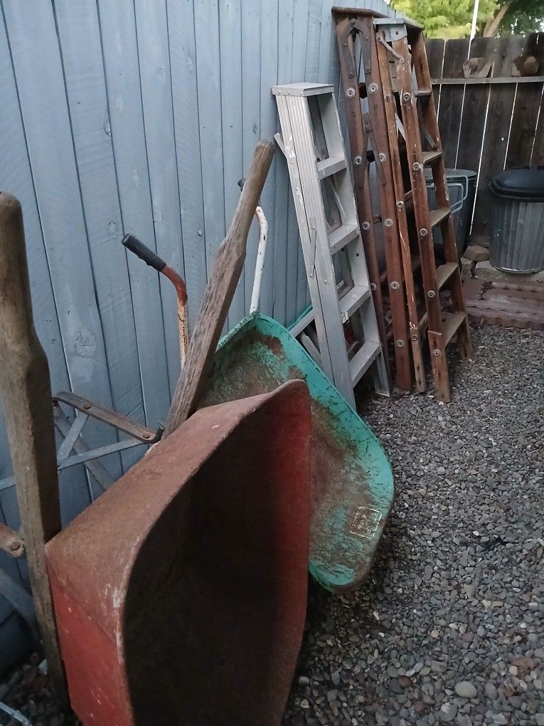 2/Wheelbarrow, 2/wood Ladders, 1/aluminum Ladder, And 1/aluminum Extinction Ladder! Must Go Take All For One BULK PRICE!!!
