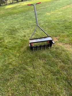 Push behind aerator.