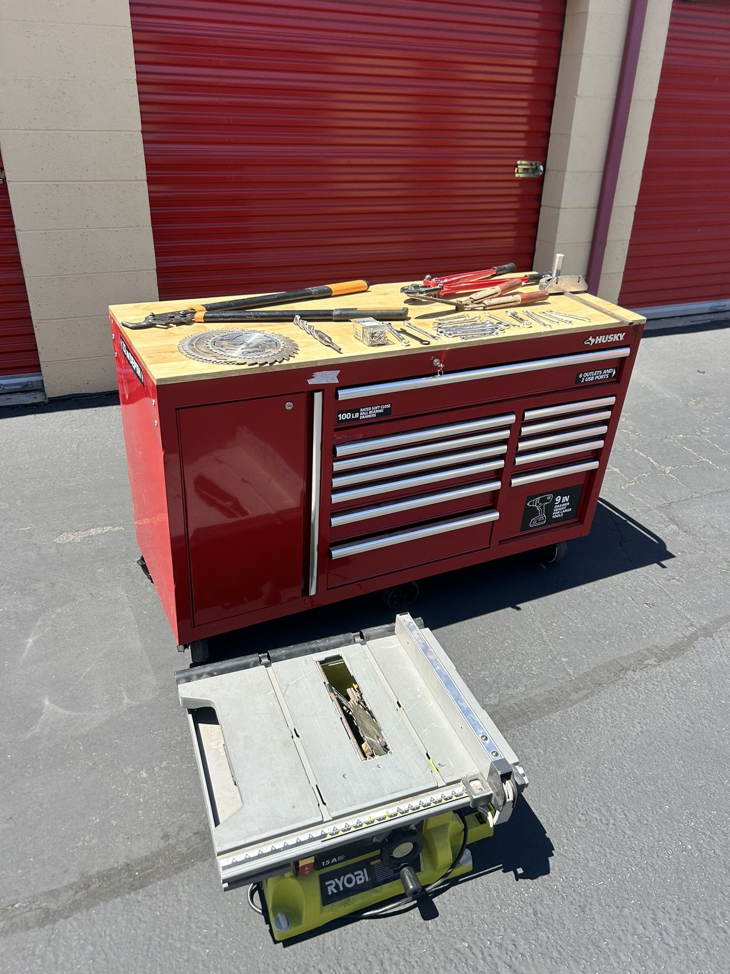 large husky work drawer includes table saw and tools