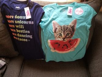 New girls justicr shirts size 6/7