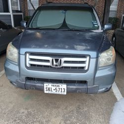 Honda Pilot 2006 Blue Tile Low Milles  Ask 7,500.00