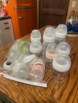 Baby bottles & onsie