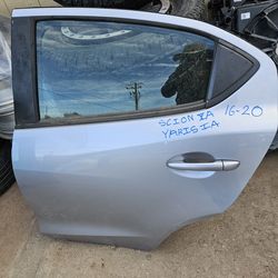 Toyota yaris IA scion IA  left rear door oem