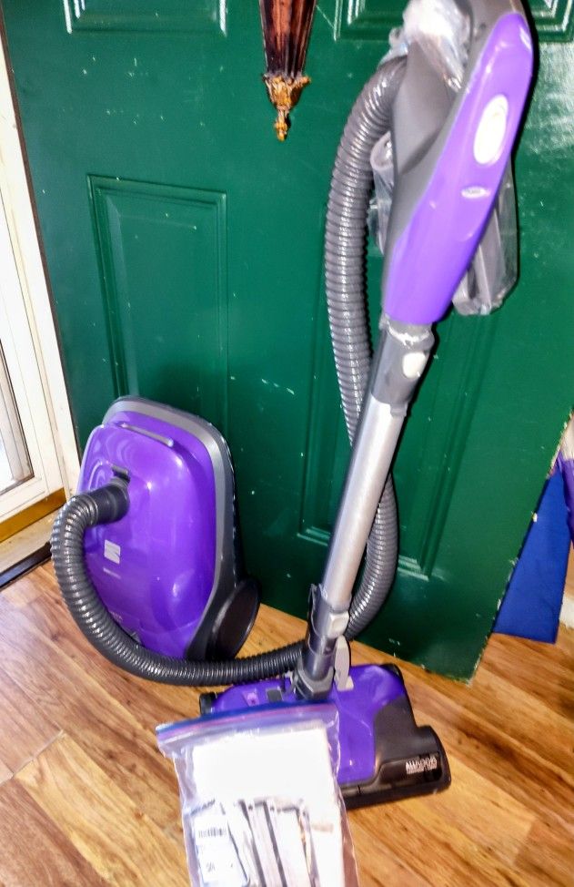 Kenmore 200 Series all floors hardwood and carpet vacuum cleaner W/4 attachments, vacuum bags and ne