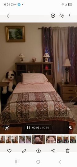 2 wooden twin beds brown