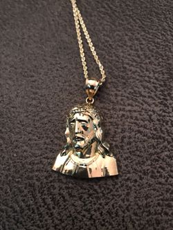 Jesus piece charm 600 Obo