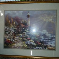 Coastal Splendor Gold Framed Seaside Lighthouse Large Art Print James Lee 32x26


This beautiful art print by James Lee depicts a serene seaside scene