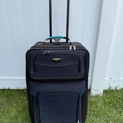 Dark blue medium checked luggage