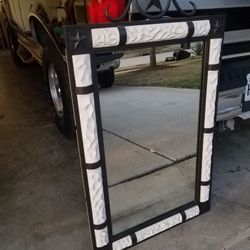 Mirrors with detachable star