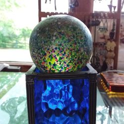 Multicolored glass paperweight