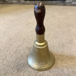 Vintage brass hand bell with a solid wood handle 