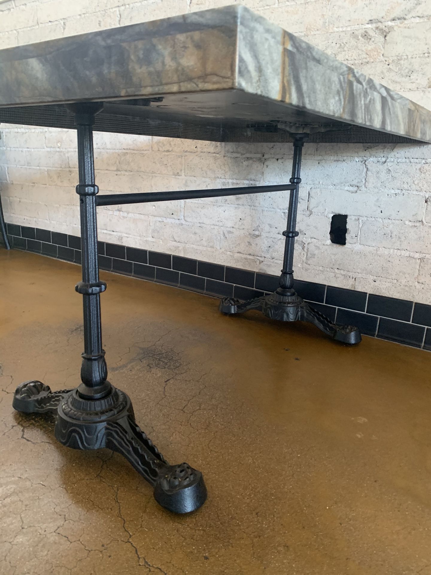 Marble Table with cast iron bases