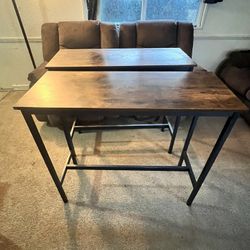 Two sets of barstools and tables