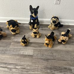 🦮Collection of Lifelike German Shepherd plush toy dogs from various brands.