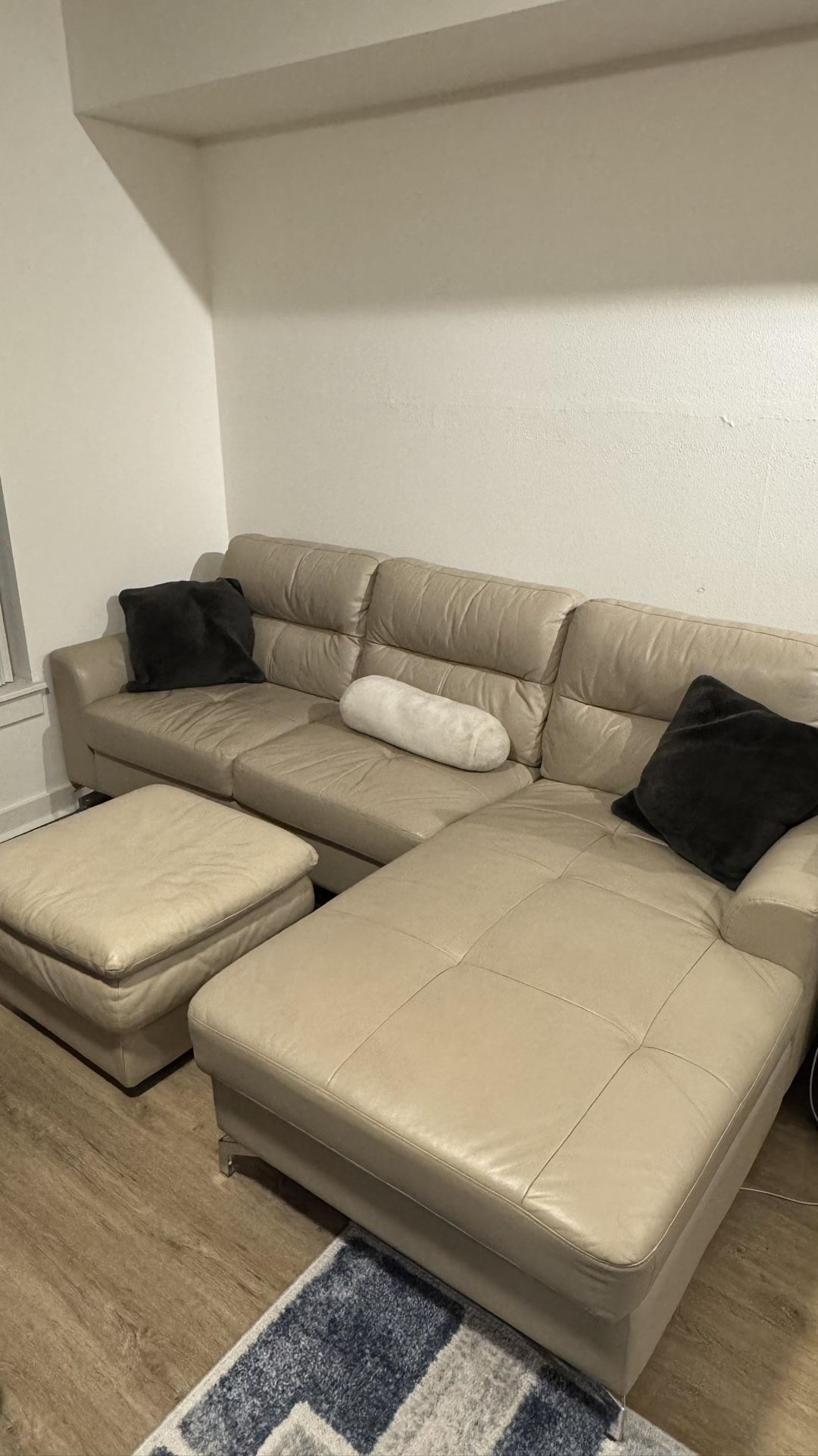 Couch With Pillows And Ottoman