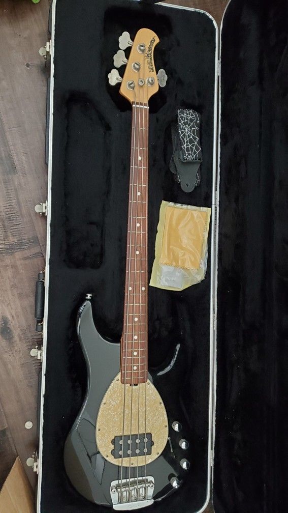 Bernie Ball Music Man 4 String Bass And A Crate Amp.