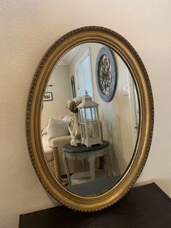 Antique oval gold mirror