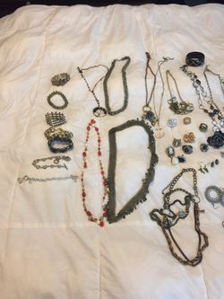 Jewelry : necklaces bracelets earring rings pins