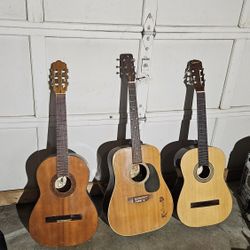 set of 3 guitars see photo