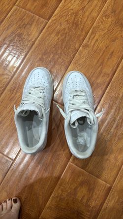 White  Nike air  leather shoes. Size 10