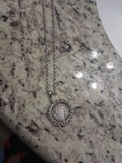 Silver coin necklace with pendant