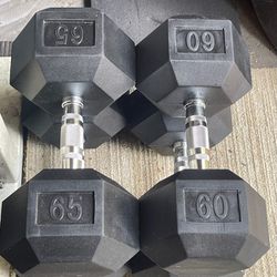 RUBBER HEX DUMBBELLS  :
(PAIRS OF) :  60s = $200  &  65s  = $220 
   *    *  *   Will Sell Separately 