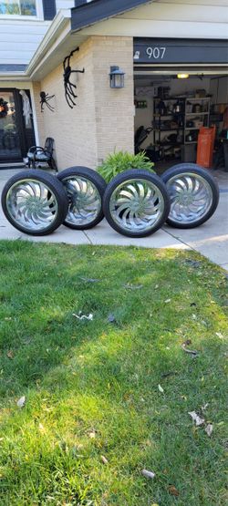 Set of 4 Chrome  Rims with Tires