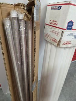 All for $48, Mixed lot of 24 4ft fluorescent light bulbs, lamps