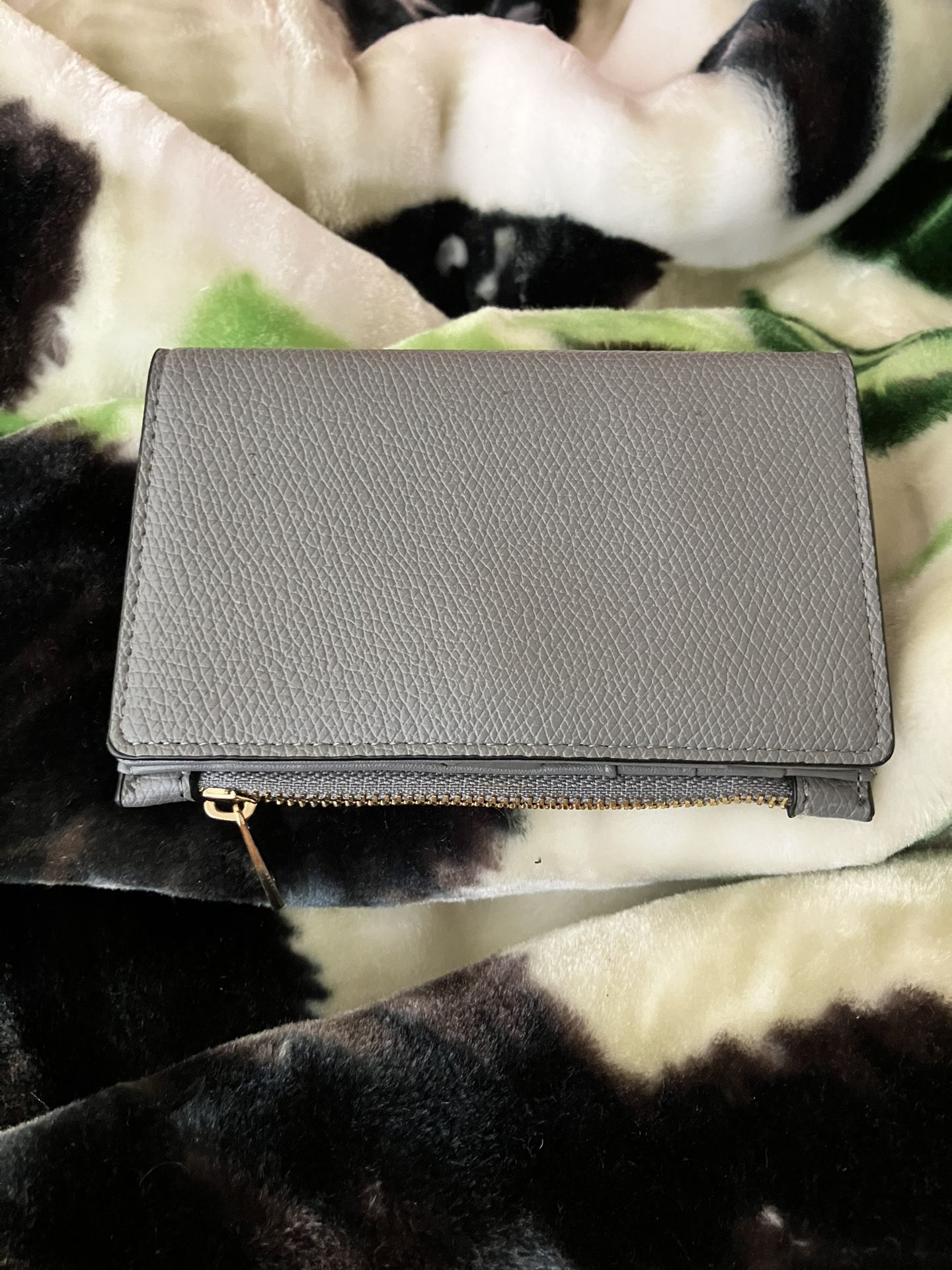 Wallet Small In Size. Never Used