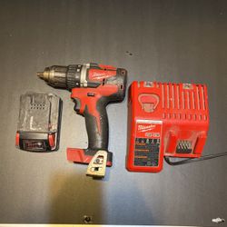 Milwaukee 2893-22 18V Compact Cordless Drill/Impact Driver and one 4.0Ah XC Lithium Ion Battery Chager and Battery 
