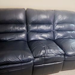 MUST GO. MAKE AN OFFER 2 piece genuine leather living room recliner couch and love seat. 