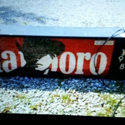 Double sided Marlboro sign and clocks