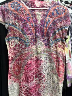 New shirt with tags. Sparkly. Girls xxl