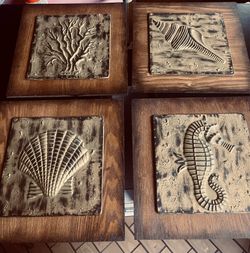 Very nice set of 4 wood and bronze pictures