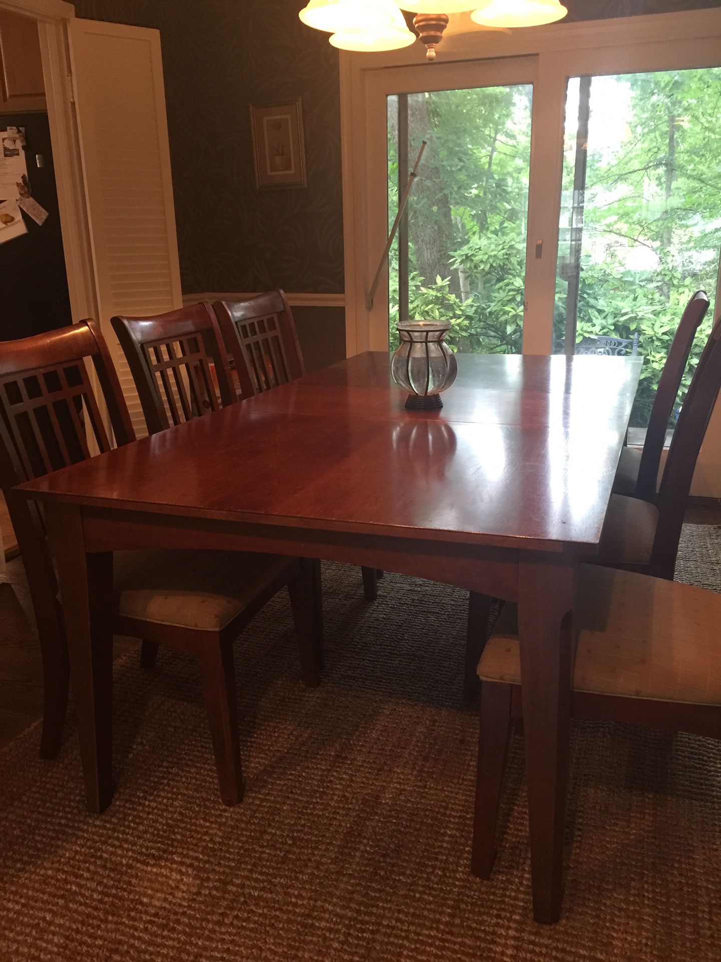Belfort dining room table and chairs