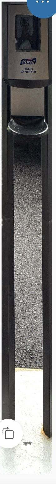 Freestanding PURELL Hand Sanitizer Floor Stand with an automatic touch-free dispenser unit