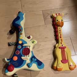 Two Toy Guitars