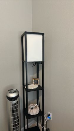 Standing lamp with shelves