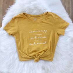 Old Navy yellow shirt, “sunny skies ahead”