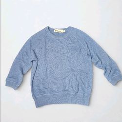 The Demylee cashmere sweater is a stylish and luxurious orange cardigan designed for women. Made from high-quality cashmere material, this sweater exu