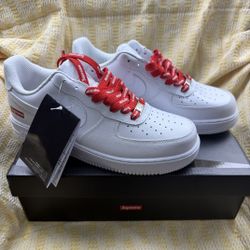 Nike Air Force 1 Supreme white sneakers