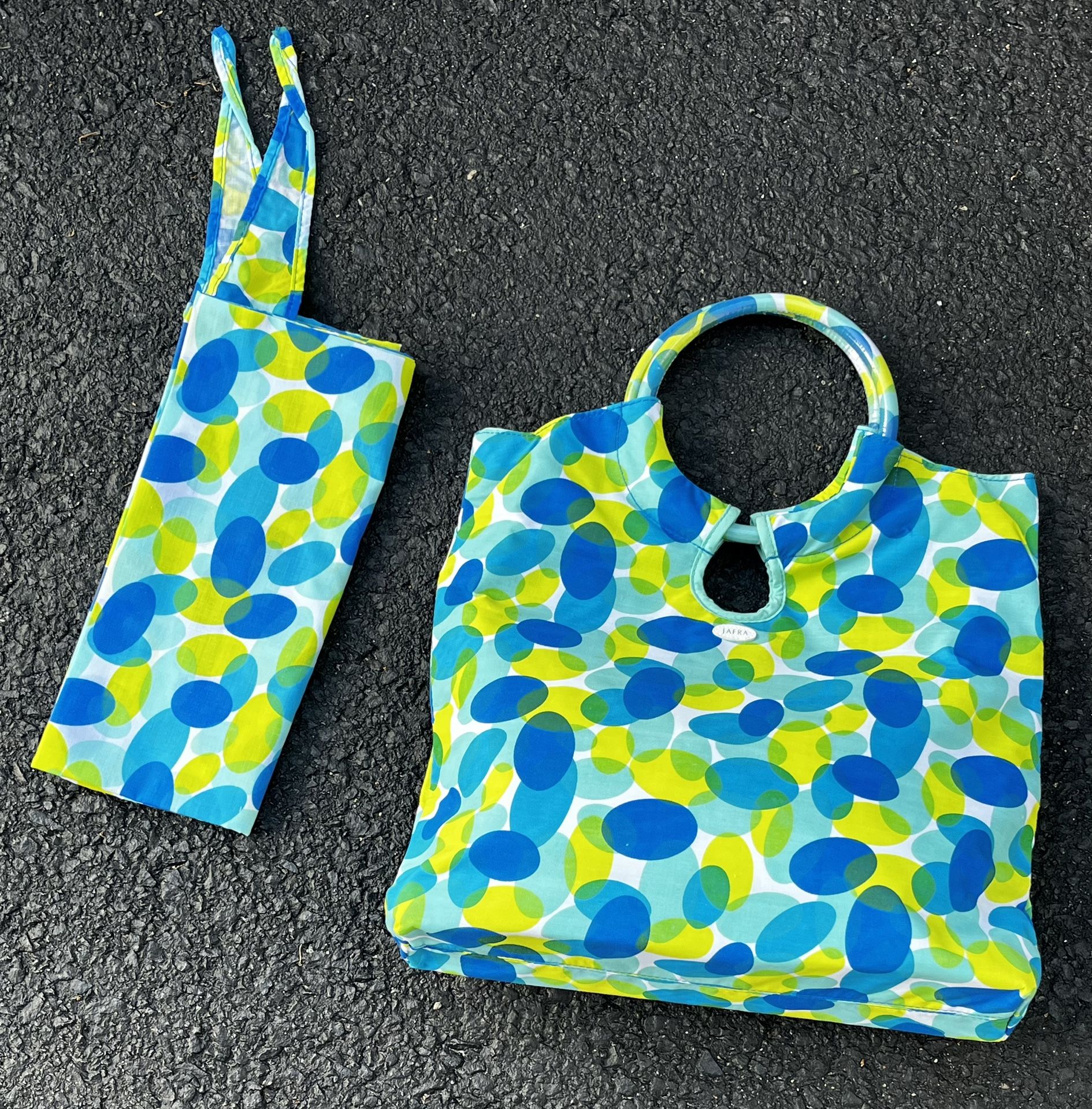 JAFRA brand vinyl tote with zipper and inside pocket