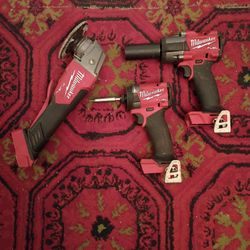 Milwaukee Fuel Impact Driver Drill 1/2 inch Grinder