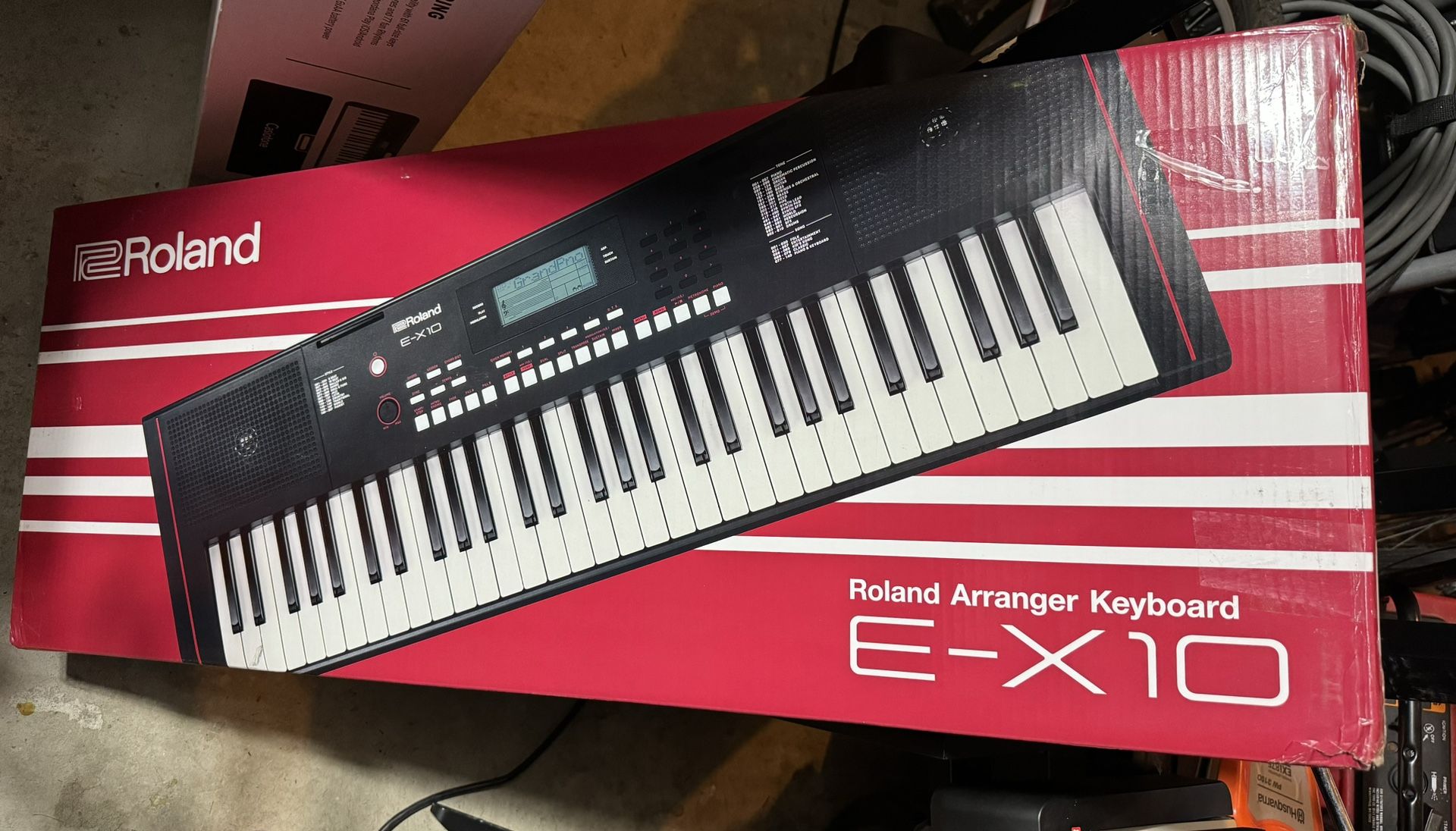 Roland E-X10 Arranger Keyboard with Music Rest and Power Adapter